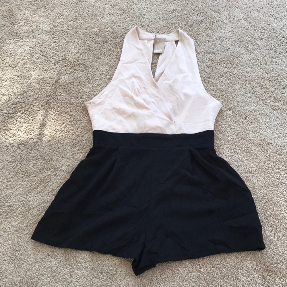 New! Odica large cream/ black combo romper .